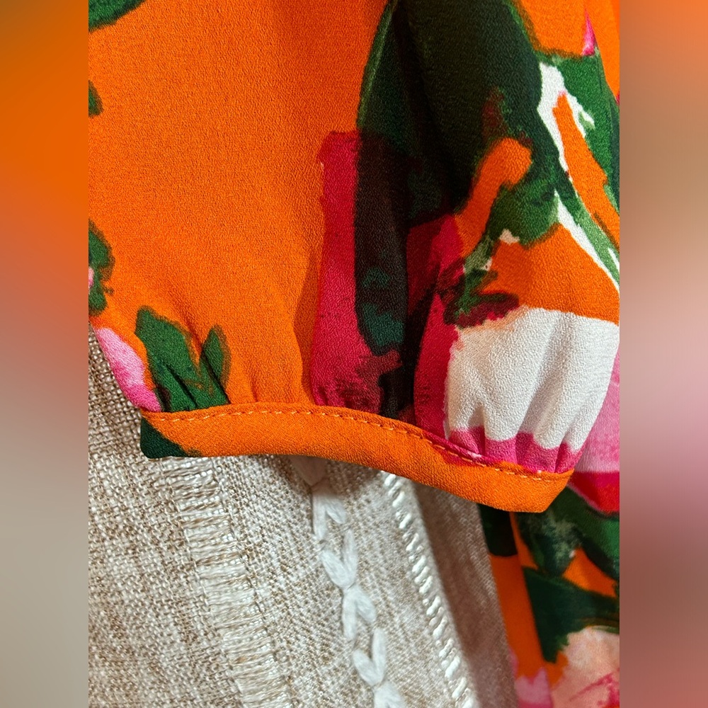 Lulu’s Sweetest Song Orange and Pink Floral Print Backless Long Sleeve Romper. - Picture 6 of 10